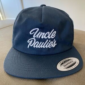Uncle Paulie’s navy snapback cap hat